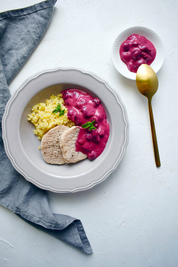 Boiled pork chop with cherry sauce