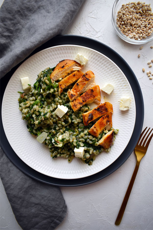Roasted chicken breast with spinach and feta barley