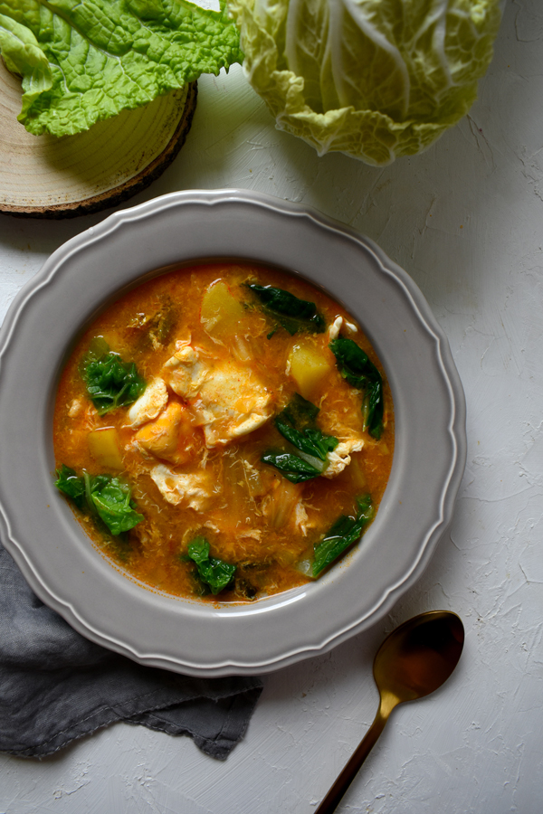 Chinese cabbage soup with poached eggs