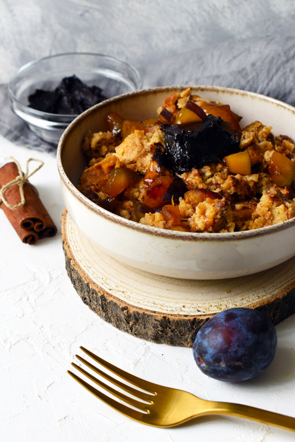 A sweet fluffy pancake with plums