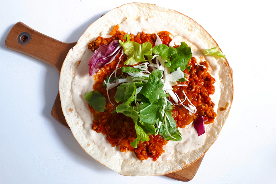 wraps with Bolognese ragout and cheese sauce