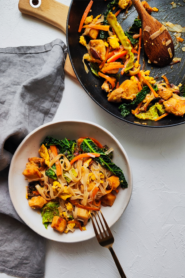 homemade pad thai in a wok