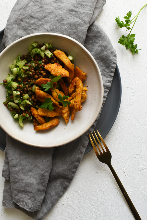 Lentil salad with celery and Kentucky spicy chicken breast