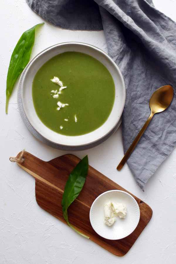 wild garlic cream soup with sheep curd