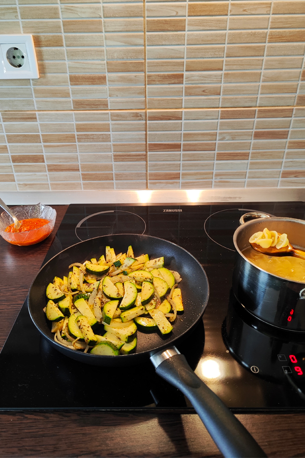 frying zucchini in a pan