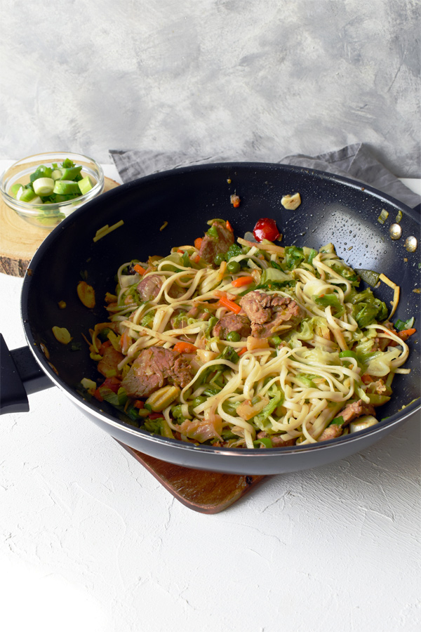 vegetables stir-fried in a wok