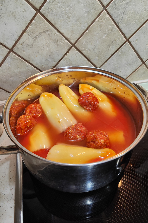 a pot of stuffed peppers